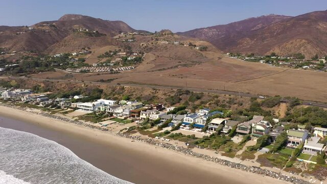 Aerial of beach community and Santa Monica Mountains in Malibu, USA