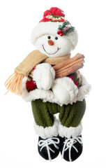 Toy snowman with cinnamon sticks in a red hat and sweater. Isolated on white background