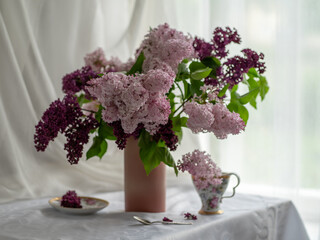 Vase with lilacs
