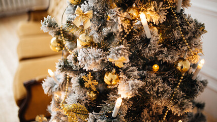 New Year tree in the Christmas interior. Stylish cozy New Year's design