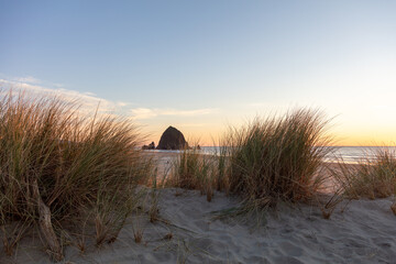 sunset over the sea Oregon coast Cannon Beach
