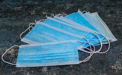 Disposable medical masks for respiratory protection during the covid-19 coronavirus pandemic close-up.