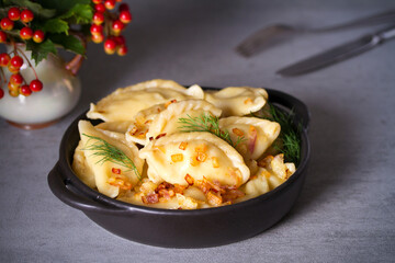 Dumplings, filled with potato. Pierogi, varenyky, vareniki, pyrohy - dumplings with filling, popular dish in many countries