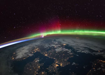 Fotobehang Aurora Borealis (noorderlicht) boven Scandinavië vanuit het International Space Statio (ISS). Elementen van deze afbeelding geleverd door NASA. © marcel