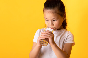 Portrait of asian girl drinking spring water