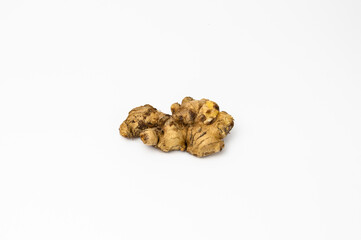 Fresh ginger on isolated white background, herb medical concept