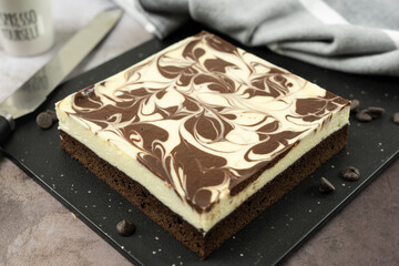 Homemade cheesecake swirl brownie ready to be served