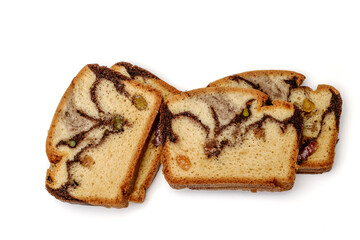 Slices of Romanian sponge cake with cocoa, turkish delight and raisins
