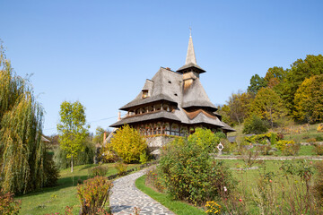 BARSAN, ROMANIA - OCTOBER 28, 2020: View of Barsana Wooden Monastery site in Maramures County, Romania.