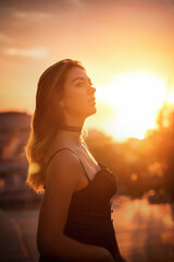 
Girl in the old city at sunrise