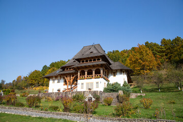 BARSAN, ROMANIA - OCTOBER 28, 2020: View of Barsana Wooden Monastery site in Maramures County, Romania.