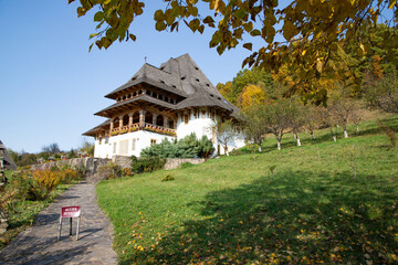 BARSAN, ROMANIA - OCTOBER 28, 2020: View of Barsana Wooden Monastery site in Maramures County, Romania.