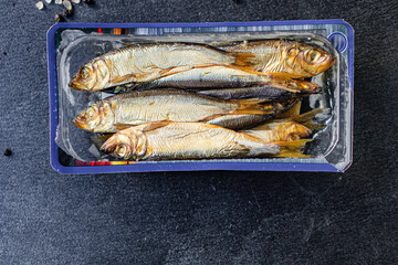 sardines sprats smoked or salted fish seafood mackerel meal on the table tasty serving size top view copy space for text food background rustic diet 