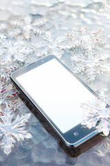 雪の結晶とスマートフォン