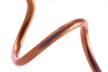 Macro of copper wire isolated on white background