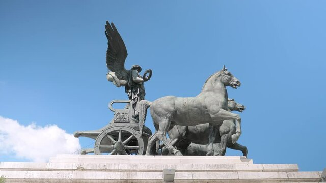 ROME,ITALY-SEPTEMBER,10,2020:The view from the Altar of the Fatherland on the bronze chariot with a statue of the winged goddess with a laurel wreath in her hand representing Freedom