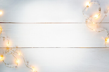 white wood horizontal texture background with yellow garland and Copy space with gray vignette