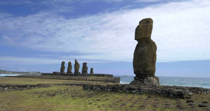 Wide, Easter Island statues along coast