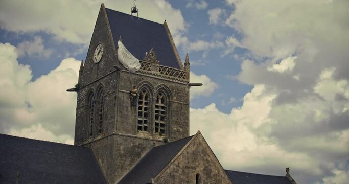 low angle, John Steele monument on St. Mere Eglise church