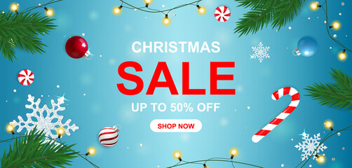 Fototapeta na wymiar Christmas sale blue banner with snowflakes and sweets. Up to 50% off.