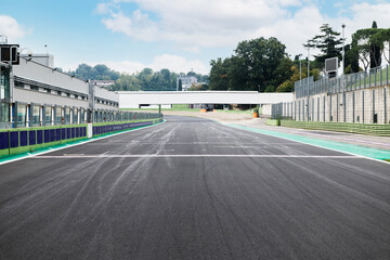 Motor sport starting and finish line straight track asphalt circuit empty front view from track...