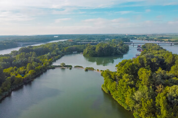 Aerial panorama of donau river close to Bratislava, Slovakia, seen from Petrzalka district on a sunny morning.