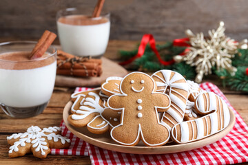 Delicious gingerbread Christmas cookies on table, closeup