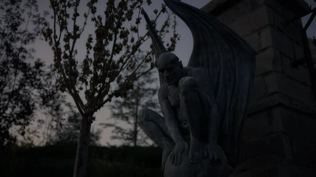 Low angle, demon statue in Evermore Park
