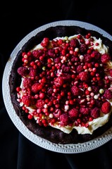No flour chocolate cake with cream cheese and berries, home baked