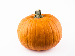 Halloween pumpkin on a white background. Ripe orange pumpkin on a white background. Fresh organic pumpkin on a white background.