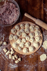 Raw Homemade Traditional Russian dumplings.