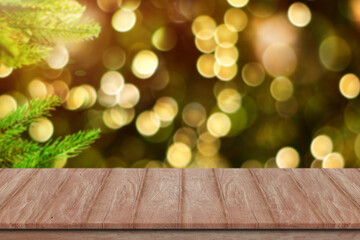 Christmas holiday background. Empty wooden deck table over bokeh light for product montage