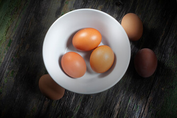 Three Eggs In White Ceramic Bowl