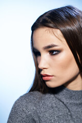 Beautiful woman cosmetics long hair cropped studio model