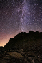 colorfull night landscape wtih star sky. astrophotography in Alps mountains