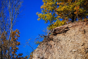Autumn forest, Mountains on a sunny day, Solvay quarries (Solvayovy lomy), Saint John under the Cliff (Svaty Jan pod Skalou), Czech Republic
