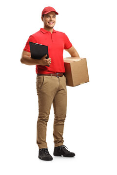 Full length portrait of a male delivery worker in a uniform holding a clipboard and a box