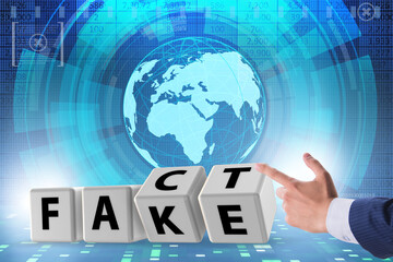 Face or fact concept with turning cubes