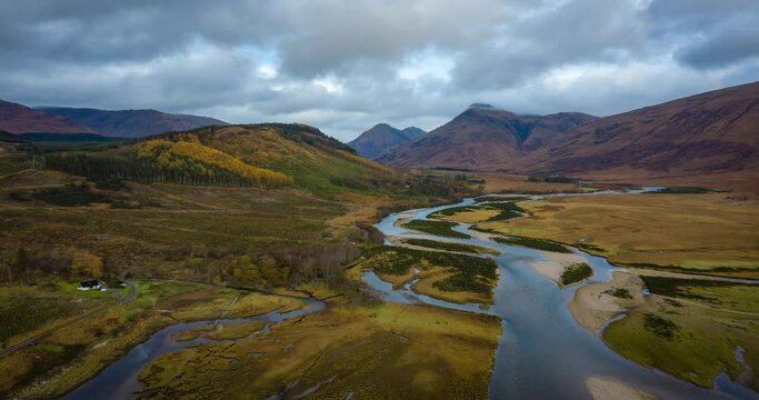 aerial hyper lapse footage of glen etive near loch etive and the entrance to glencoe and rannoch moor in the argyll region of the highlands of scotland during autumn