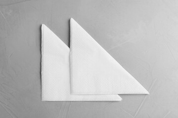 Clean napkins on light table, top view