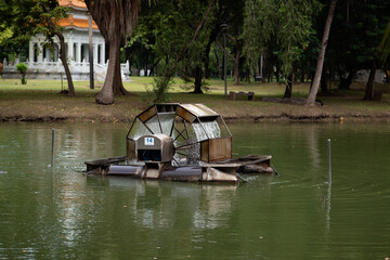 Obraz premium Turbine baler Installed in the pond to increase oxygen to the water in Thailand..