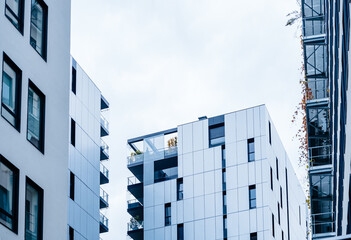 Close-up telephoto view of French new residential district with modern apartment building with...