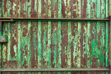 Old iron door with rusty paint