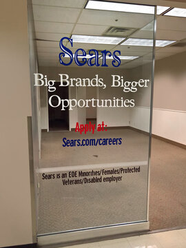 Help wanted jobs and careers sign at a shuttered Sears retail store in Spokane, Washington on October 19, 2019.