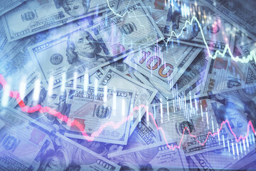 Double exposure of forex graph drawing over us dollars bill background. Concept of financial markets.