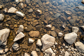 Top down view of a rocky stream with clear water. Taken in St Marys Glacier area of Colorado