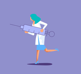 Female doctor with a huge syringe