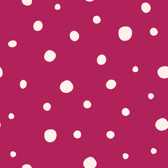 Cute hand drawn white snow polka dots seamless pattern on dark red background. Christmas snowflakes. Great for winter fabric, textile, nursery decoration, Christmas wrapping paper, scrapbooking