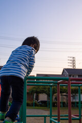 Japanese kindergarten children playing in a jungle gym in a park in Gifu City, Gifu Prefecture