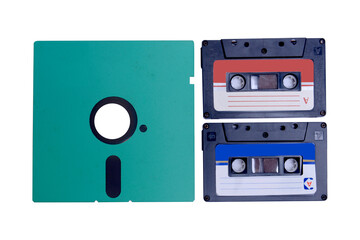 Close up view of the floppy disk and old audiotape cassette